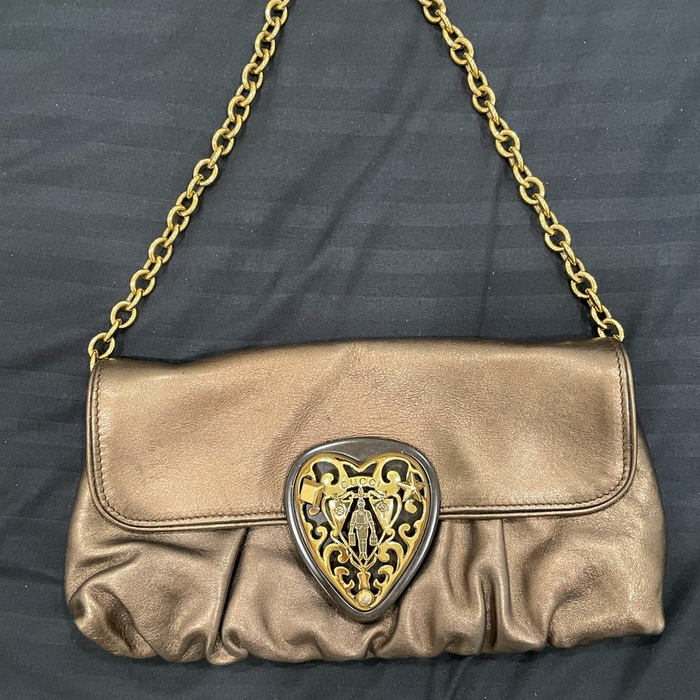 Gucci leather mini bag metallic bronze color